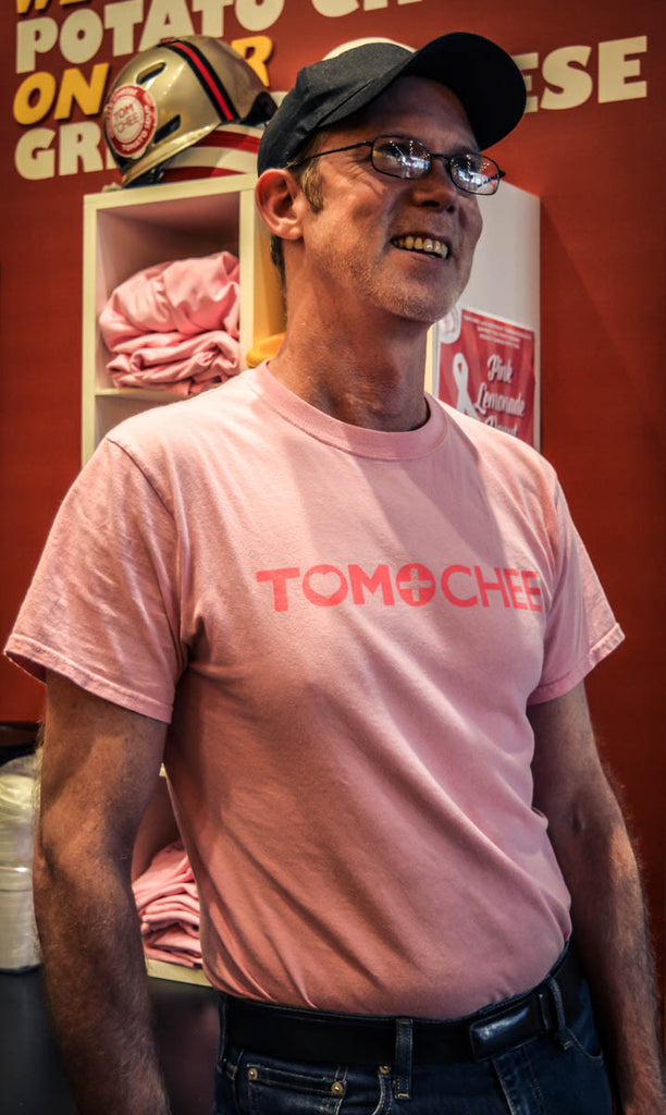 SUPPORT BREAST CANCER RESEARCH WITH A PINK TOM AND CHEE TEE